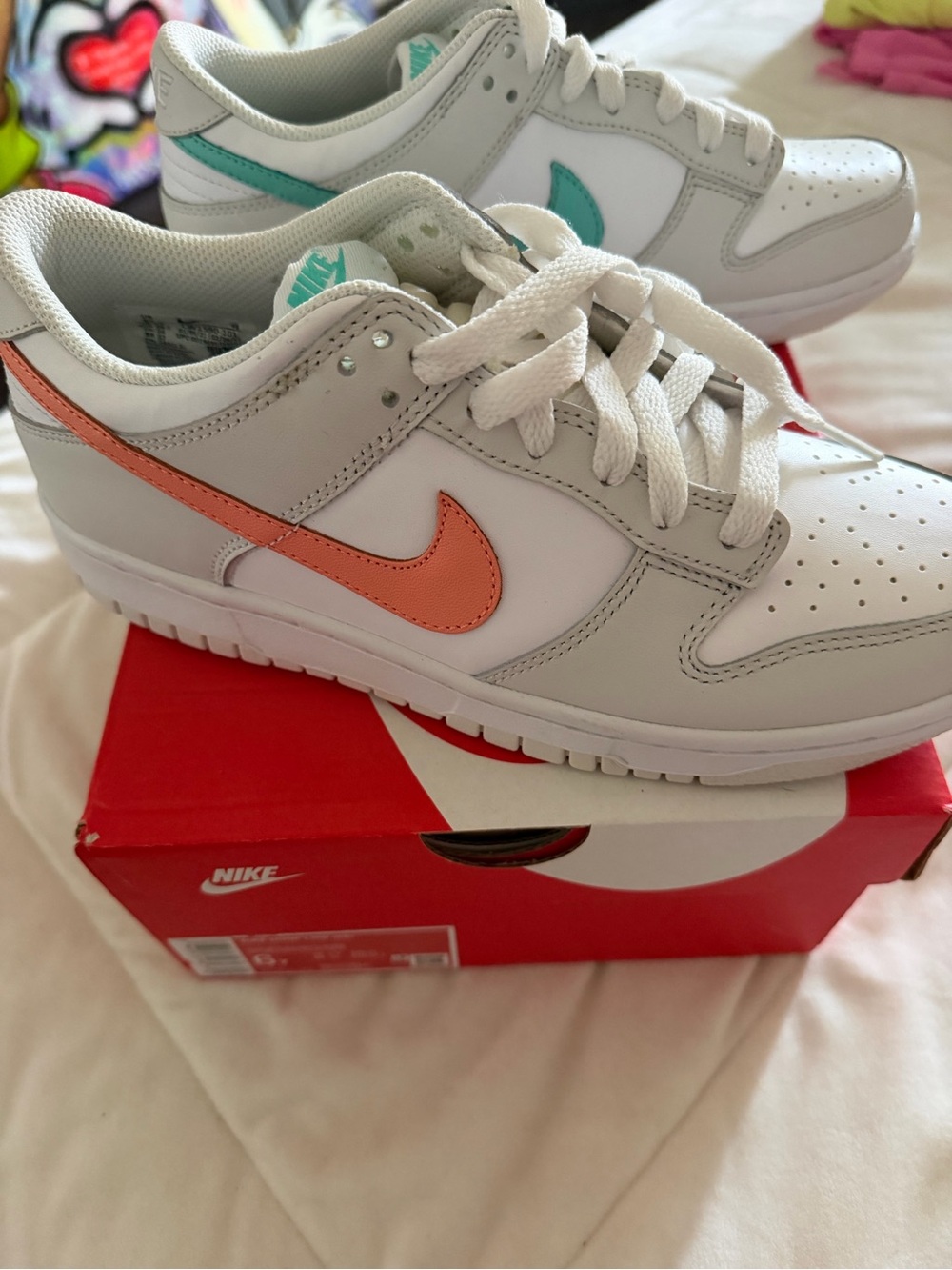 Nike White Low-Top Dunks with Teal Accents